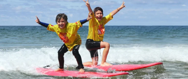 Cours de surf de surf enfants tandem planche de surf Côte Sauvage ESCS – ESCS La Palmyre Côte Sauvage