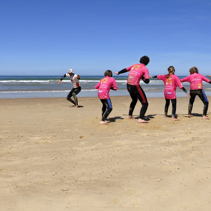 Échauffement cours de surf collectif de surf plage Côte Sauvage ESCS – ESCS La Palmyre Côte Sauvage